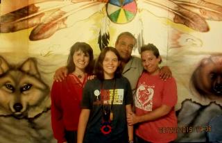 During the Powwow at the federal prison. Pictured (L to R): Karen Van Fossan, Anonymous, Rattler (NoDAPL Political Prisoner), Sandra Freeman.