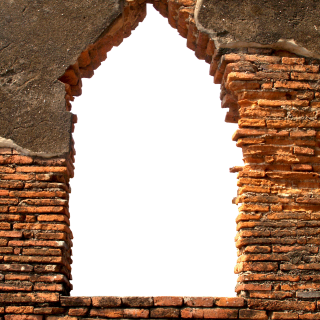 Old brick wall with window opening and cracked plaster