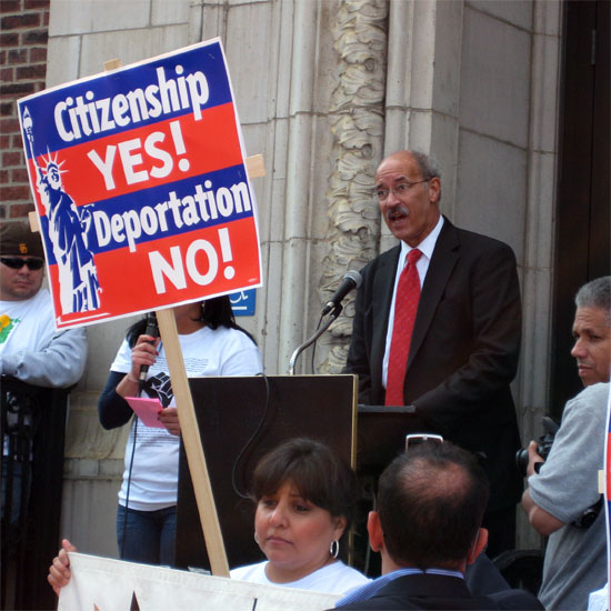 Sinkford speaking at an immigration rally; a sign in the foreground reads: 'Citizenship YES! Deportation NO!' Photo by Audra Friend/UUA.