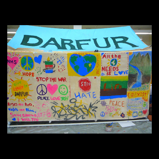 A tent made of signs asking for peace in Darfur. Photo by Adam Gerhardstein/UUA.