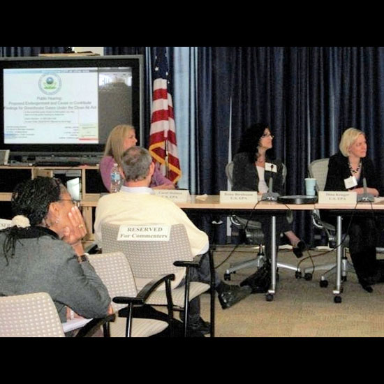 EPA Commissioners at a panel table listen to testimony. Photo by Bill Crowley.