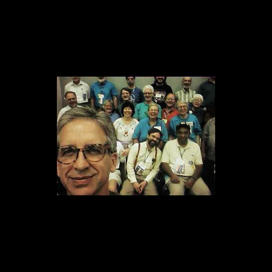 Jim Mason in the lower left using a digital camera to capture himself with the Netheads. UUA archives.