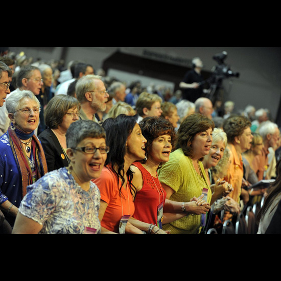 Crowd shot: people singing at the 2010 General Assembly Opening and Plenary I. Photo by Nancy Pierce.