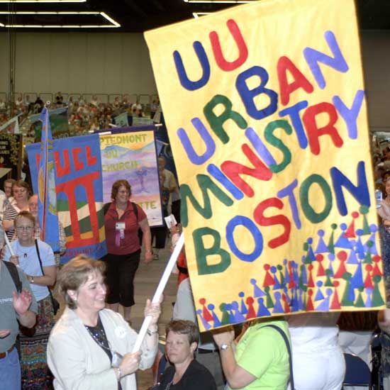 Partner Church Council banner in parade. Photo by Nancy Pierce.