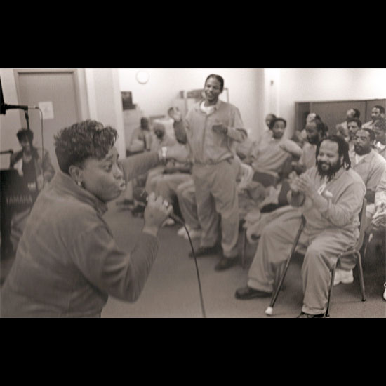 Woman singing at the Wabash Valley Correctional Facility. Photo by Rich Remsberg.