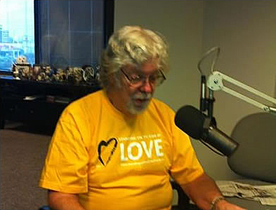 Don Hymel recording the UUWorld for the visually impaired. 