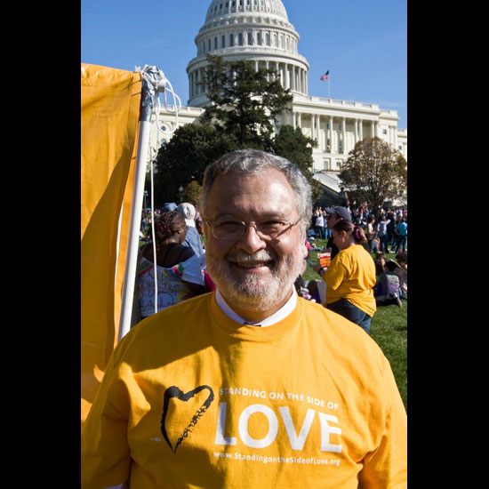 Peter Morales, wearing a 'Standing on the Side of Love' t-shirt, standing in front of the U.S. Capitol. Photo courtesy the Standing on the Side of Love Campaign.