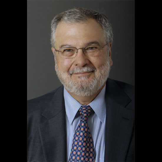 Peter Morales, smiling in a formal headshot. Photo by Nancy Pierce.