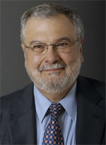 Peter Morales, smiling in a formal headshot. Photo by Nancy Pierce.