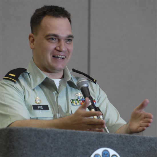 David Pyle, speaking and gesturing with his hands. Photo by Nancy Pierce.