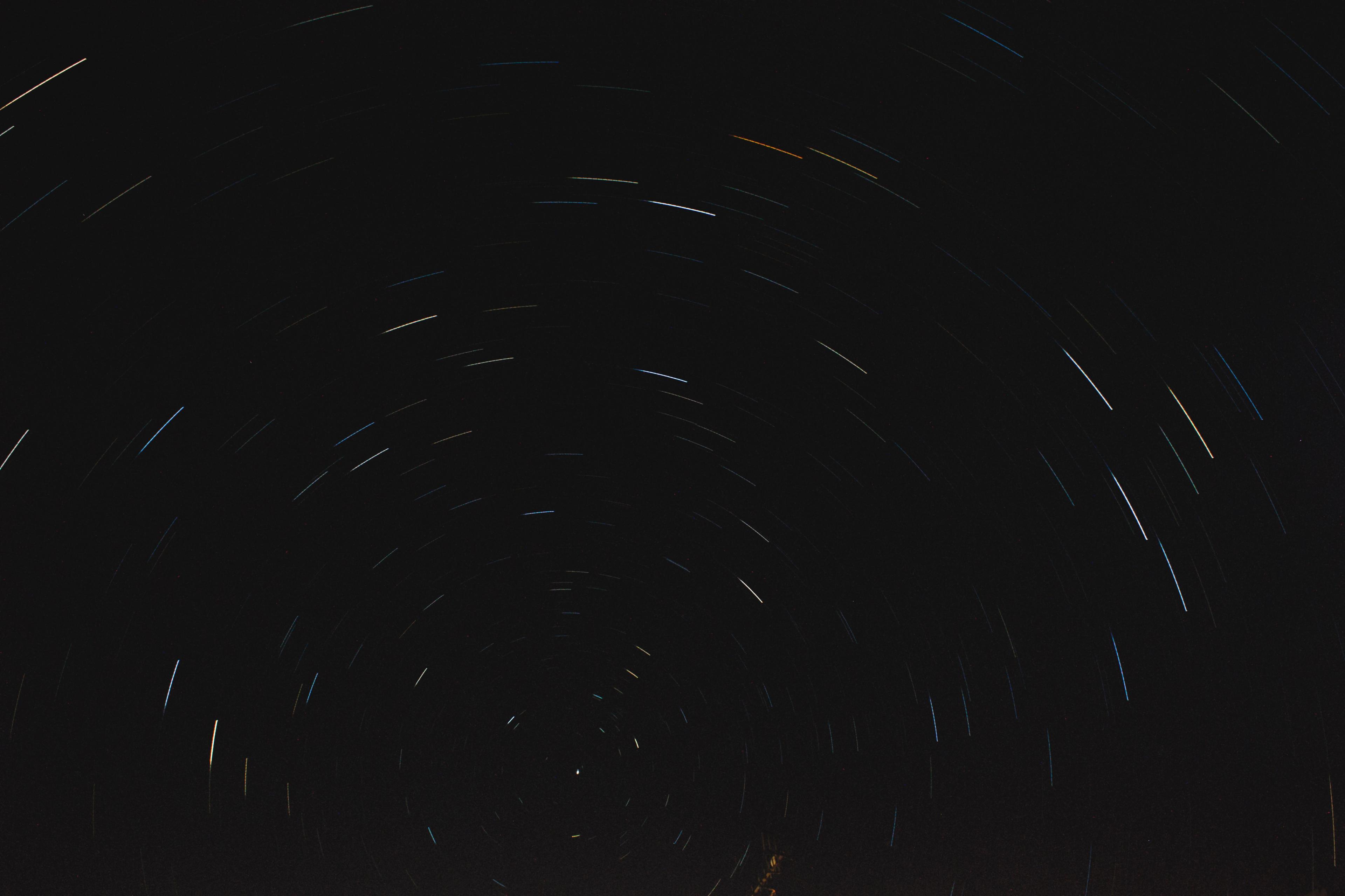 A long exposure, stacked image of the Pole Star and the light trail caused by the planets rotation.