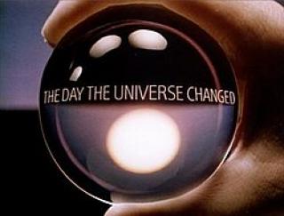 The Day the Universe Changed, words across a lens being held by a hand.