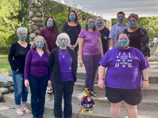 Central East Region staff, masked and at a gazebo.
