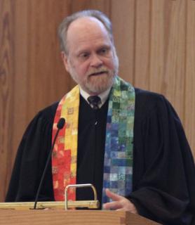Rev. Phil Lund in pulpit