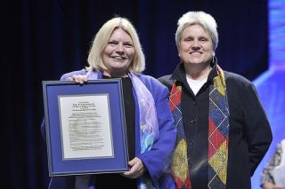 Judith Frediani presents the 2013 Maclean Award to Rev. Linda Olsen Peebles.