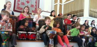 Children drumming at First parish UU Bedford, MA.