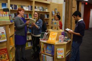 People standing in the UUA's inSpirit bookstore.