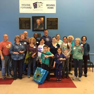 Members of UU Church of Charlotte, NC volunteering at a homeless shelter