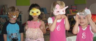 Four young children wearing masks at UUC of Emerson, Marietta, GA