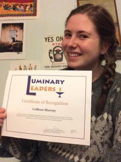 Colleen Murray holders here Luminary Leaders Certificate of Recognition.