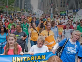 Image of UUs marching for climate justice in New York City.