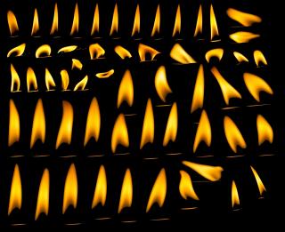 Dozens of flames on a black background