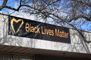 Black Lives Matter banner with Standing on the Side of Love heart at UUCGV, Grand Junction