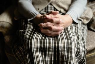 Elder's lap with folded hands