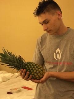 GA Youth Staff Caring for a Pineapple, the symbol of hospitality