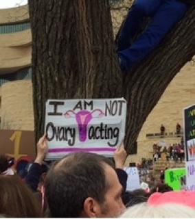 The Washington, DC Women's March more than filled the national Mall. A sign reads, "I am not 'Ovary Acting.'"