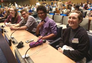 Four youth leaders at the 2016 UU-UNO Intergenerational Spring Seminar Theme Panel at UN Headquarters.