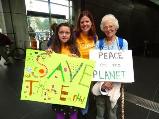 Three generations support environmental justice at the People's Climate March in New York City