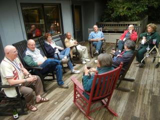 Circle of older adults chatting at The Mountain Retreat and Learning Center
