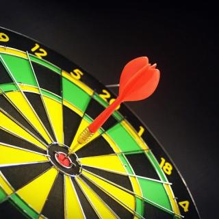 dart in the center of a bullseye