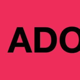 "ADORE" written on a hot pink background
