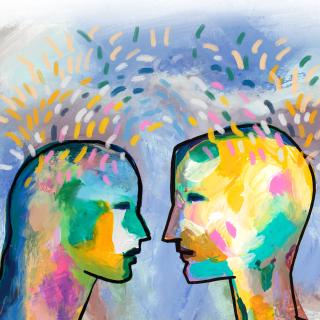 A colorful, simple painting of two people's heads facing one another, with brighly colored sparks or energy radiating off of them.