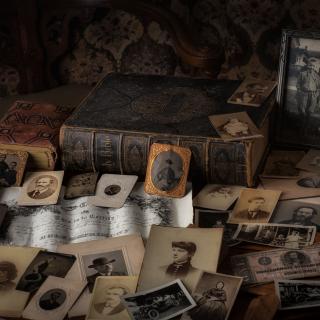 An array of old photographs and vintage books