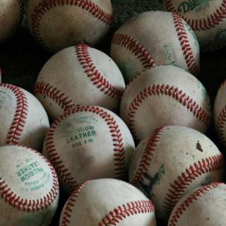 a pile of baseballs