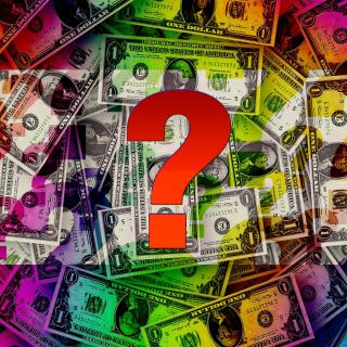 Question mark superimposed over dollar bills