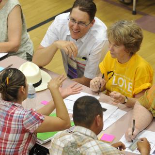 Attendees at UUA General Assembly in 2012 meet with local Phoenix partners at a citizenship fair.