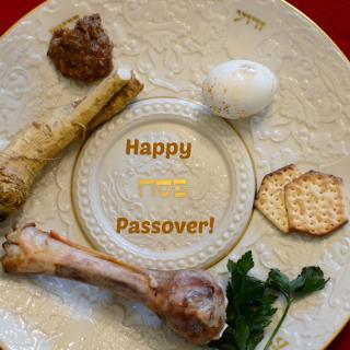 Traditional Pesach items arranged on a seder plate