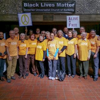Members of UU Church of Berkeley with their Black Lives Matter Banner