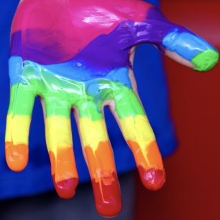 Rainbow painted hand